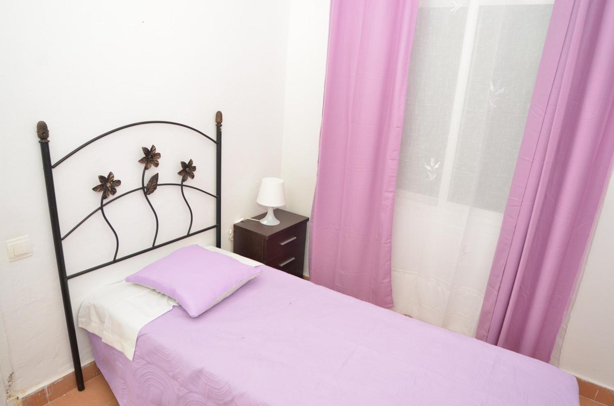 Quarto em Acomodações Particulares Big In Heart Dowtown Málaga